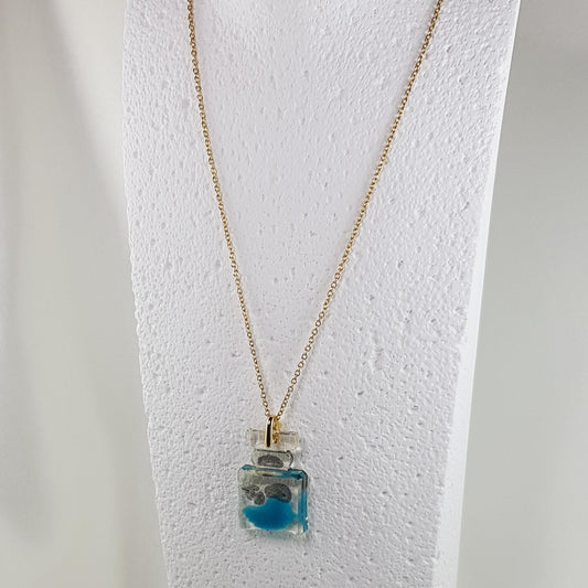 Collier Pendentif Flacon Gaby Teal - Élégance Moderne - Les Secrets de Louisettecollier